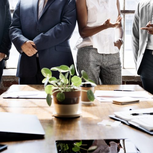 Business people brainstorming in a meeting Business people brainstorming in a meeting