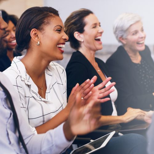 Applauding the best seminar lecturer.