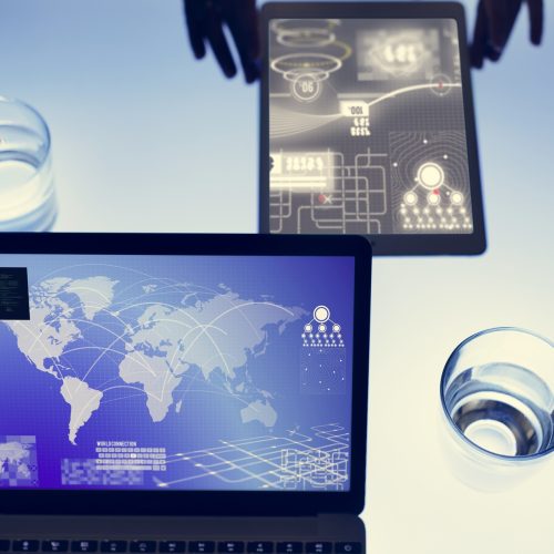 Hands using tablet on a cyber space table Hands using tablet on a cyber space table