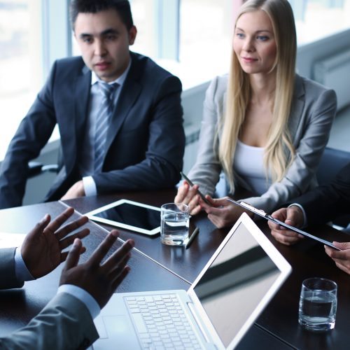 Image of business people interacting at meeting