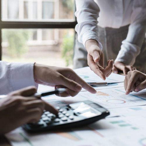 Business teamwork hands, paperwork graphs and planning annual report data, research and office budget. Company discussion with documents in strategy meeting, analytics progress and financial stats Business teamwork hands, paperwork graphs and planning annual report data, research and office budget. Company discussion with documents in strategy meeting, analytics progress and financial stats.