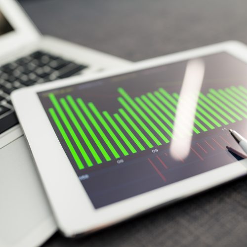 Business workplace with stock market data