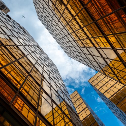 gold skyscraper building at Hong Kong, business modern architecture urban downtown office
